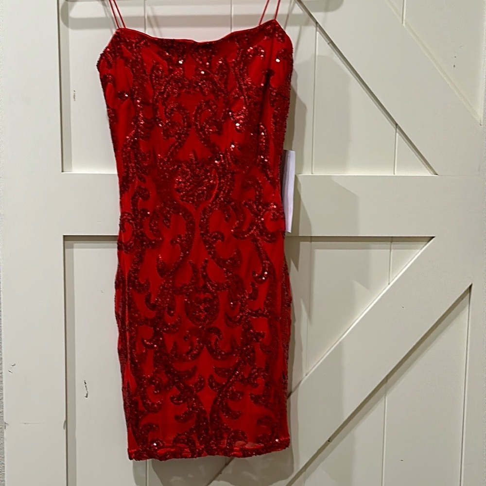 NWT Formal sequin dress. Pit is 16” & stretches to 18”. Length is 34 1/2” medium